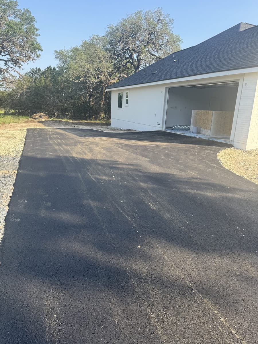 New asphalt driveway at a Hill Country home